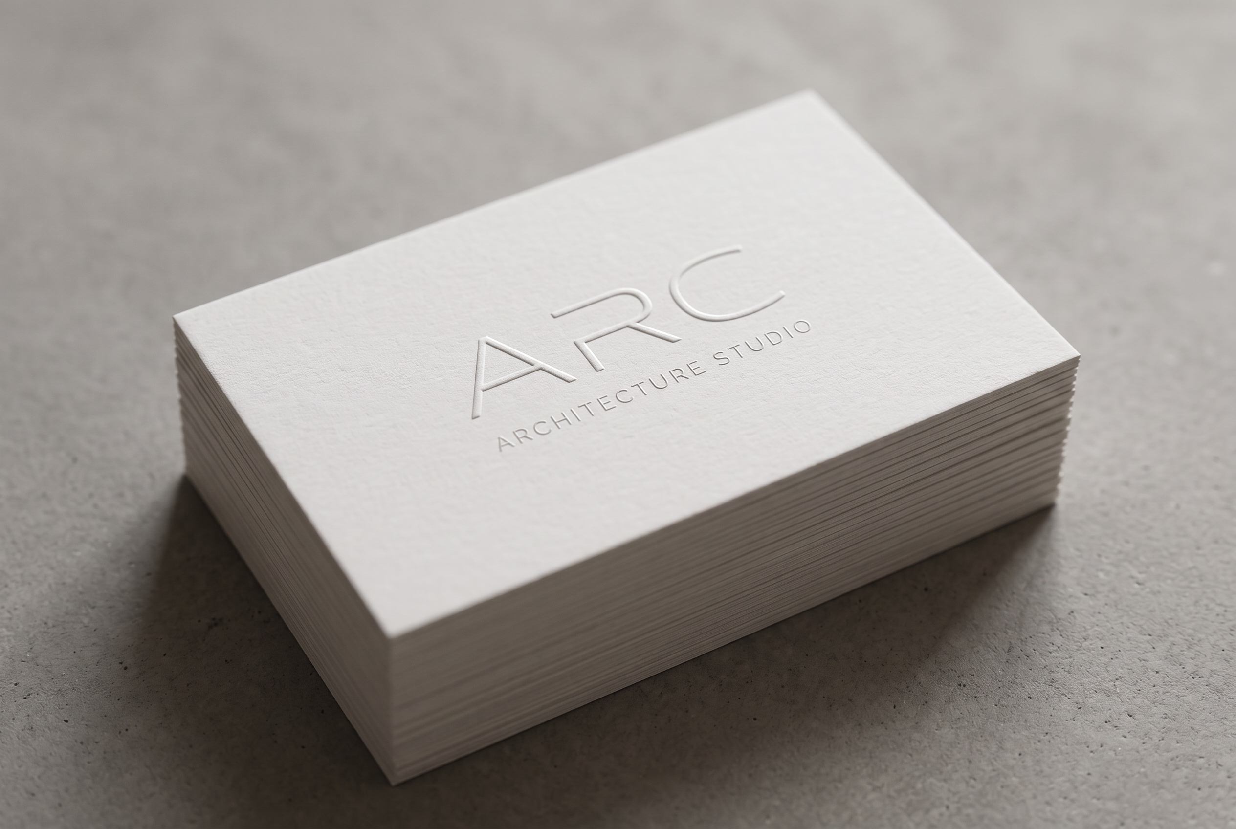ARC blind embossed business cards