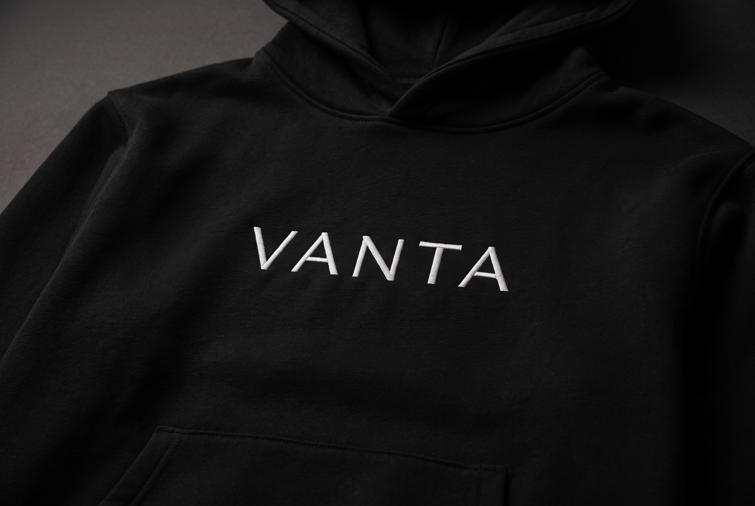 VANTA wordmark embroidered on a black hoodie